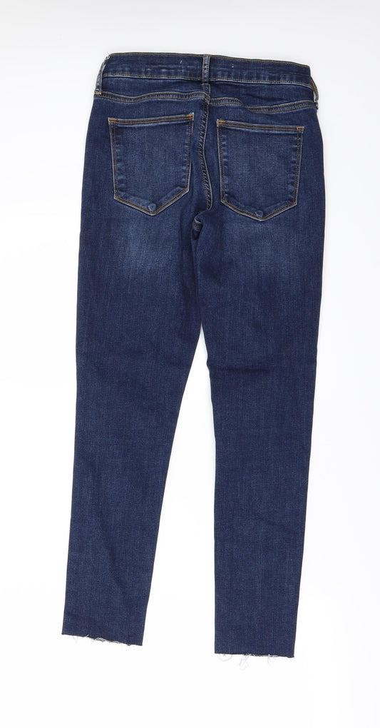 Back view of Gap women’s blue denim skinny jeans, size UK 26, 26-inch leg - frayed hem