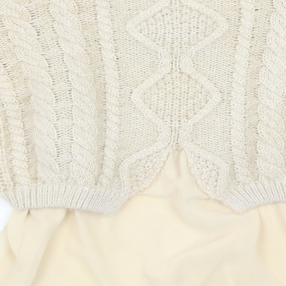 Brand and care label for Cameo Rose women’s beige jumper, size L