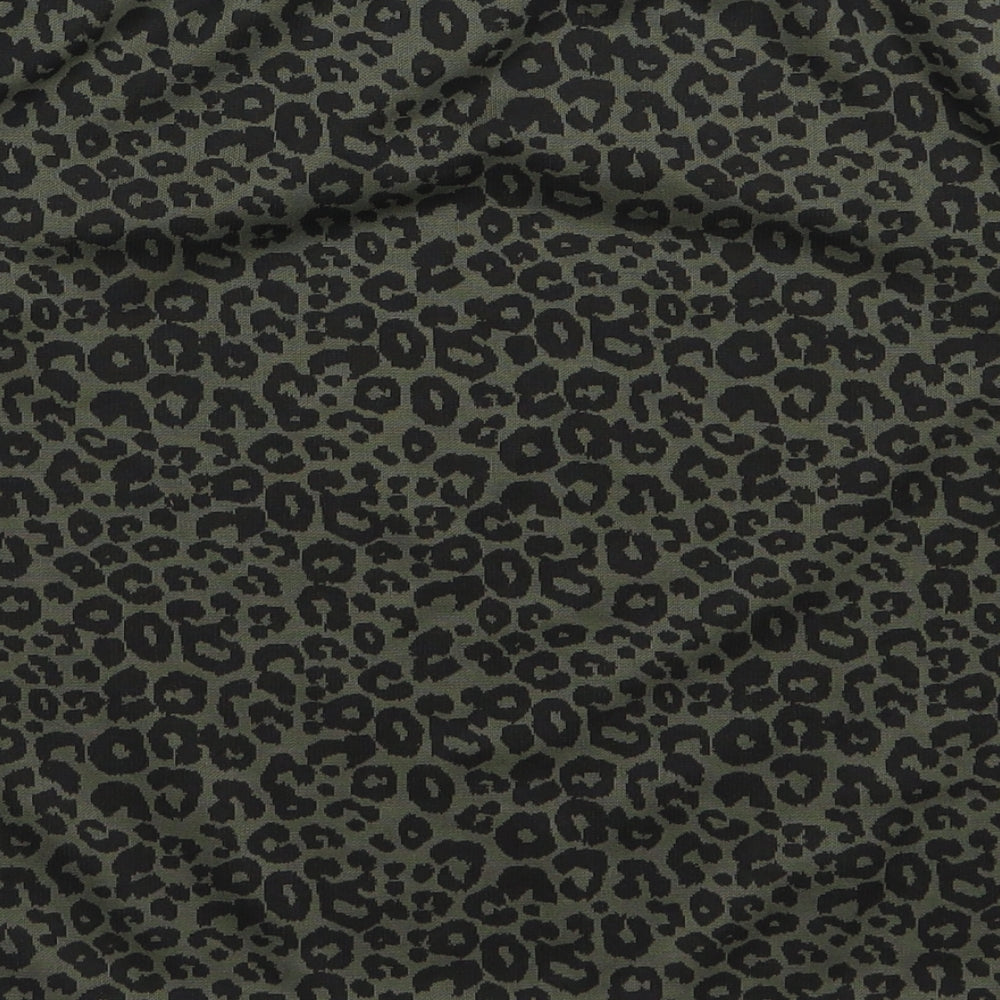 Brand and care label for New Look women’s green animal print a-line skirt, size UK 8