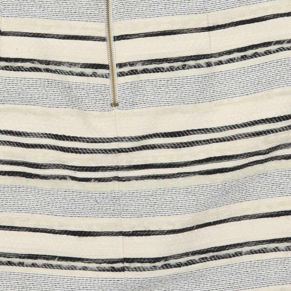 Brand and care label for H&M women’s beige striped straight & pencil skirt, size UK 12