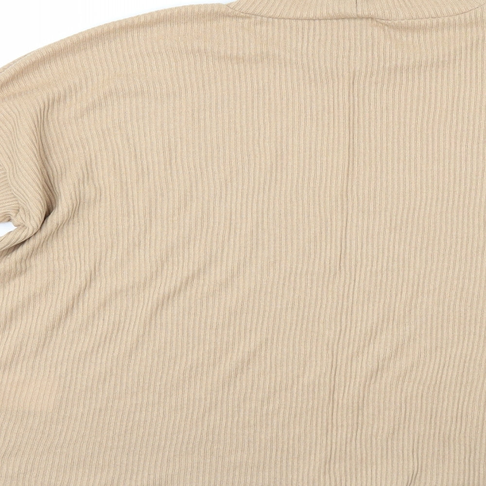 Brand and care label for Divided by H&M women’s beige jumper, size M