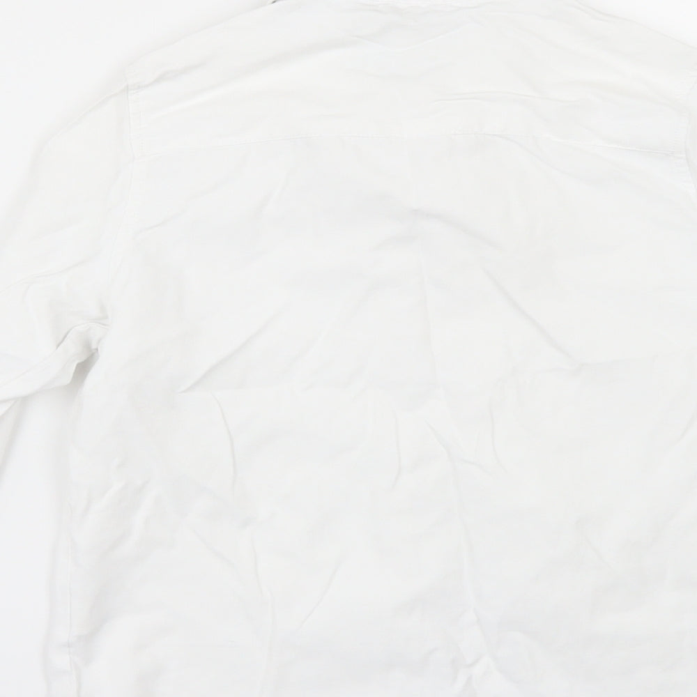 Brand and care label for Primark boys’ white basic button-up, size 9-10, years