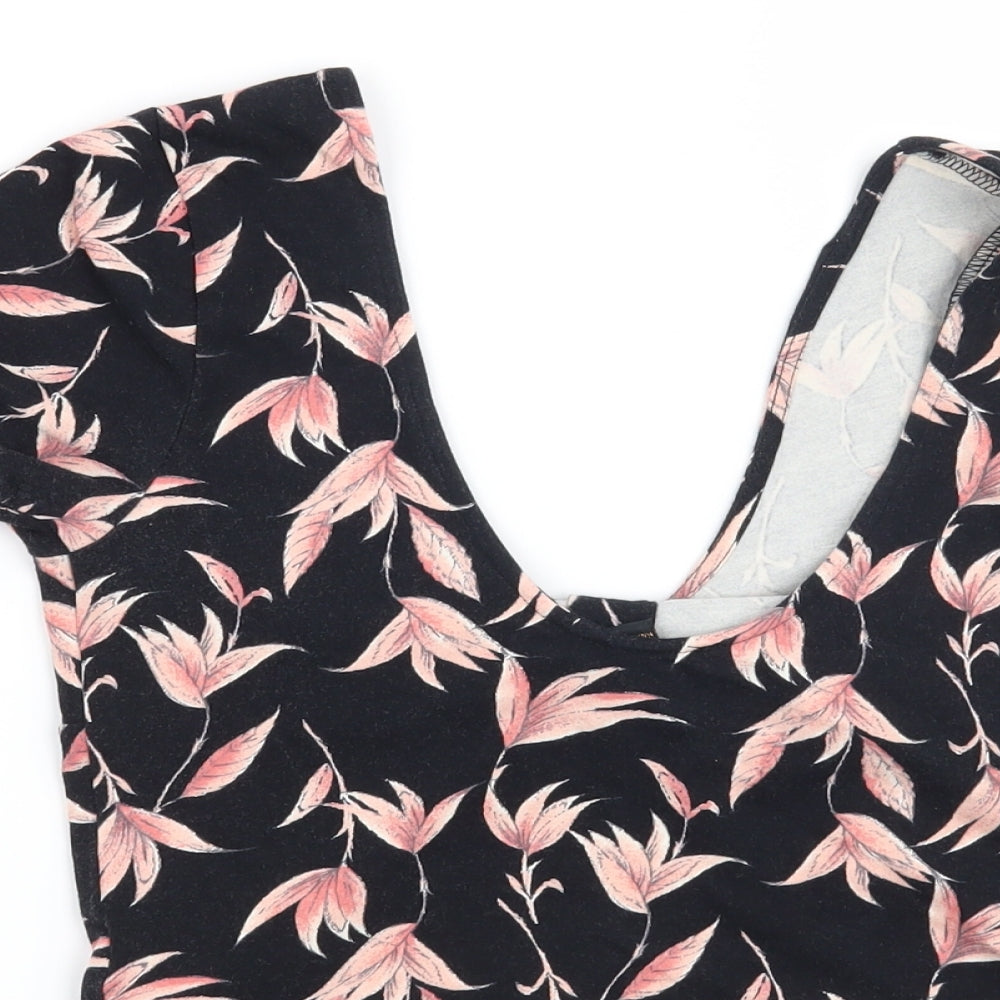 Brand and care label for Forever 21 women’s black floral basic t-shirt, size M