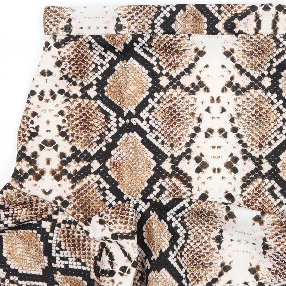 Brand and care label for PRETTYLITTLETHING women’s brown animal print a-line skirt, size UK 6