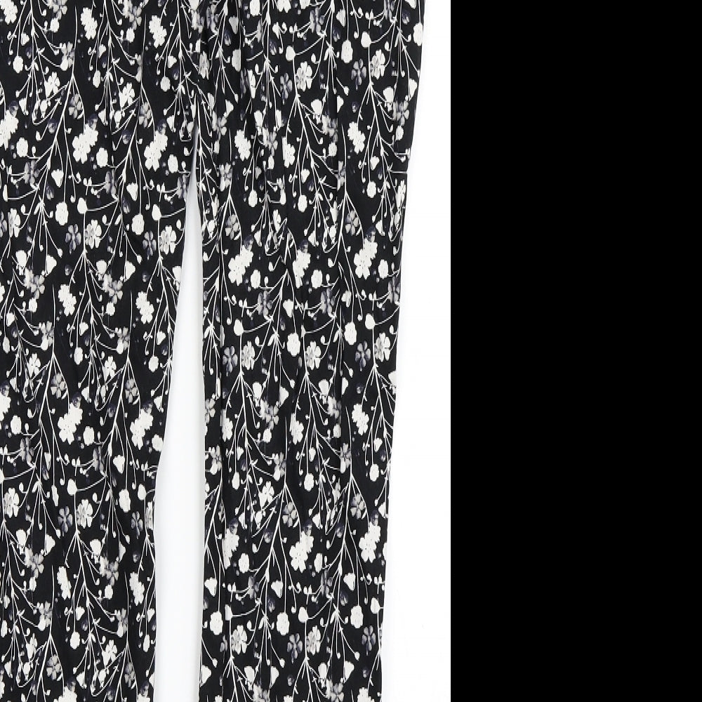 Brand and care label for Primark women’s black floral trousers, size UK 8, 25-inch leg