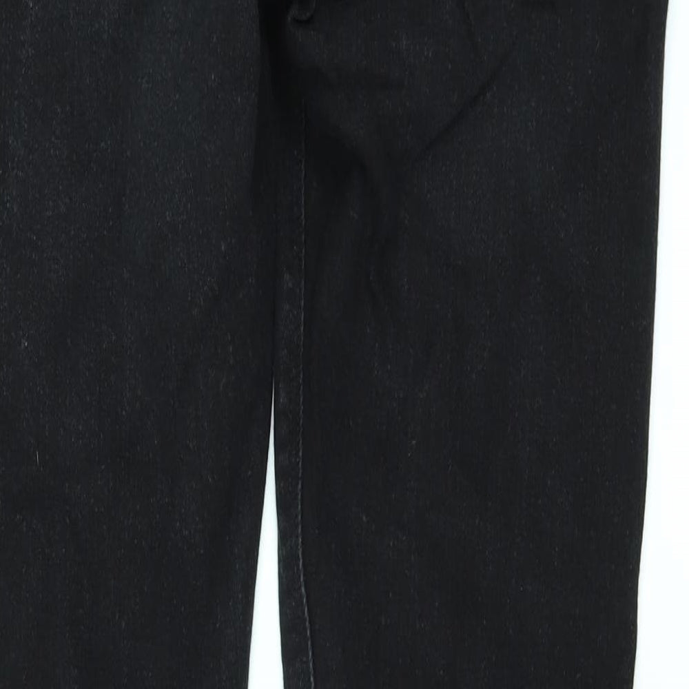 Brand and care label for ASOS women’s black denim skinny jeans, size UK 32, 32-inch leg
