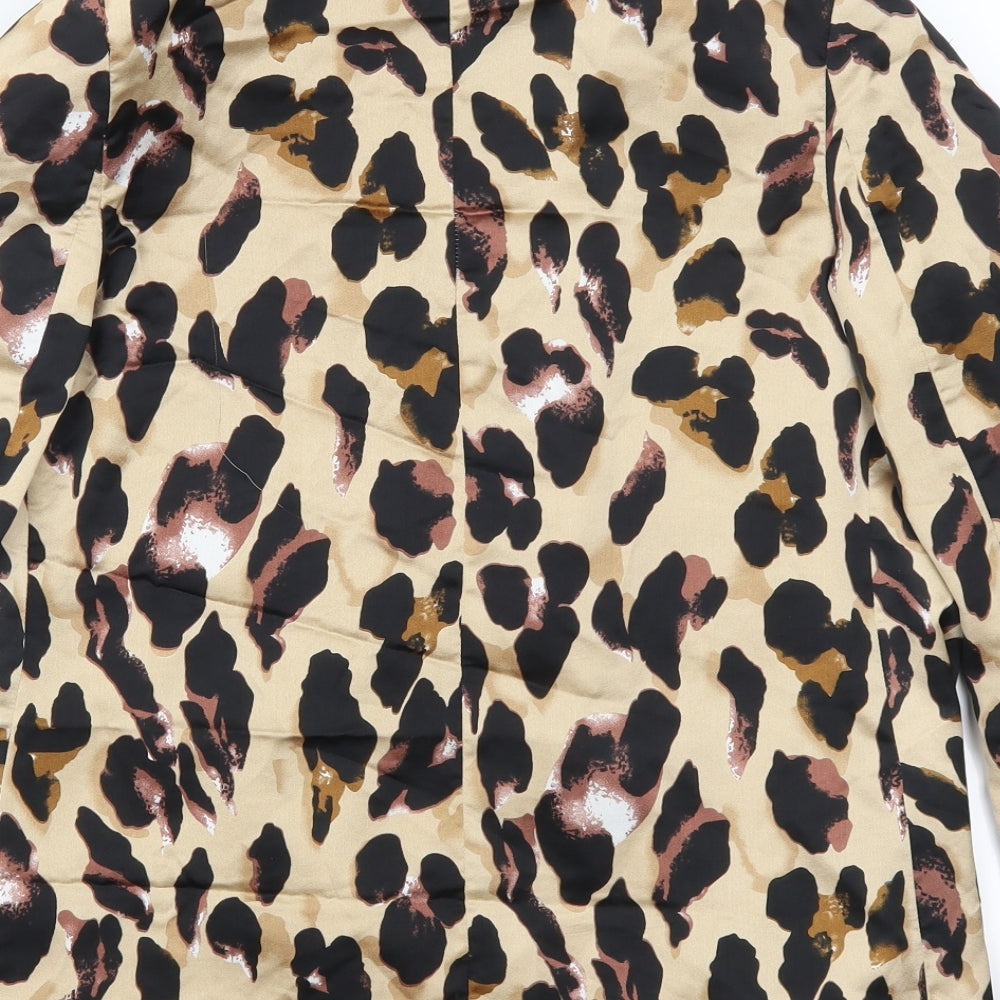 Brand and care label for Missguided women’s beige animal print jacket, size UK 8