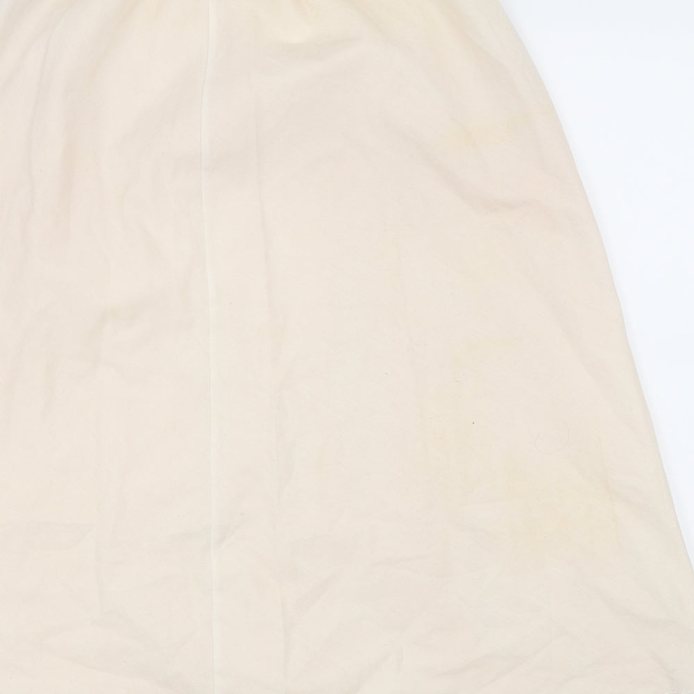 Brand and care label for BHS women’s beige pettiskirt skirt, size UK 12