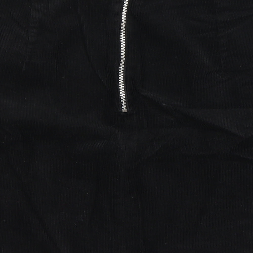 Brand and care label for New Look women’s black a-line skirt, size UK 10