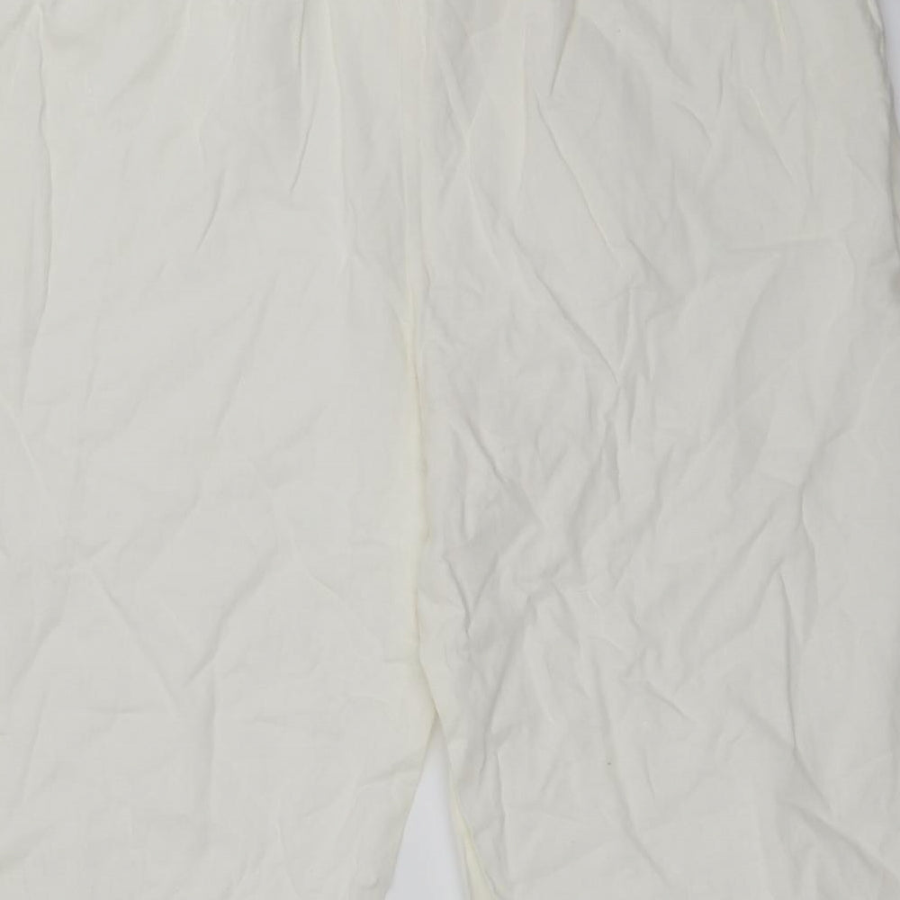 Brand and care label for Preworn women’s ivory cropped trousers, size UK 34, in, 20-inch leg