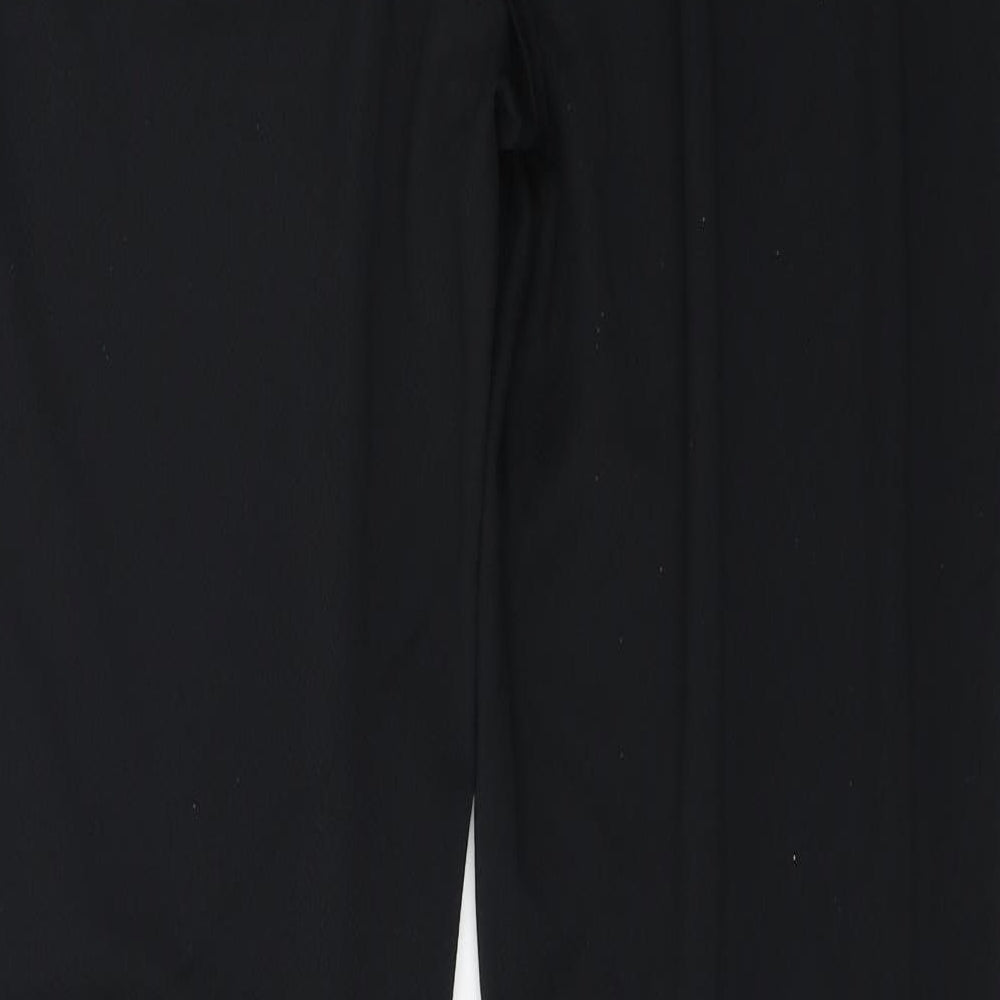 Brand and care label for Yessica women’s black trousers, size UK 36, in, 27-inch leg