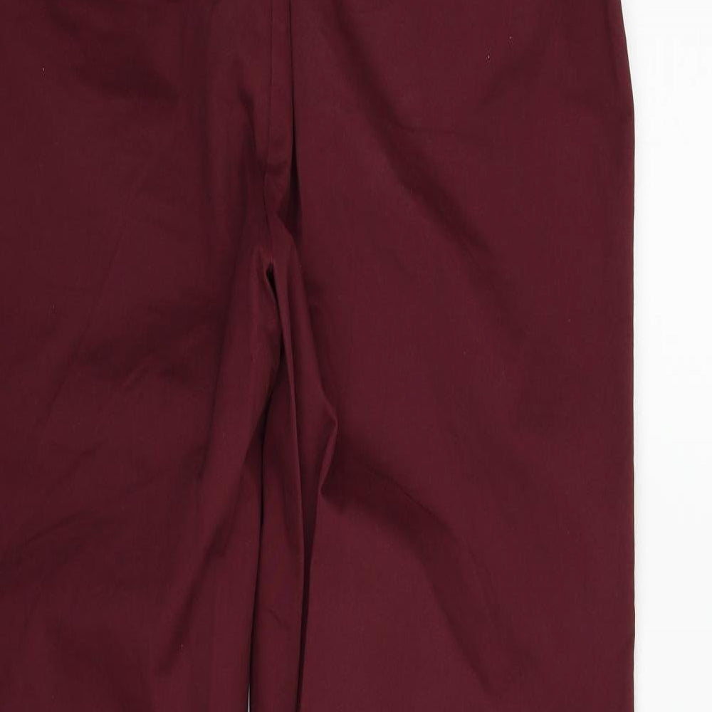 Brand and care label for Matalan women’s red houndstooth trousers, size UK 34, in, 30-inch leg