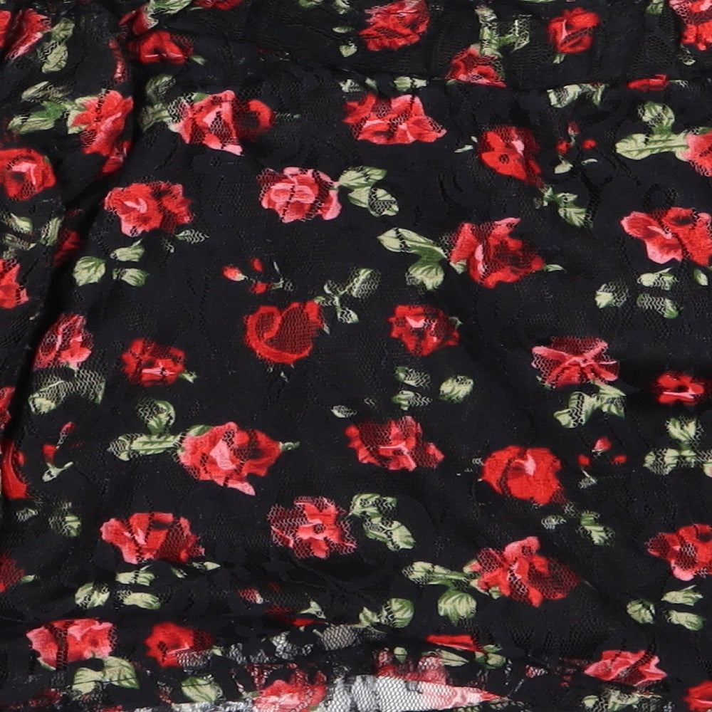 Brand and care label for Primark women’s black floral cropped tank, size UK 12