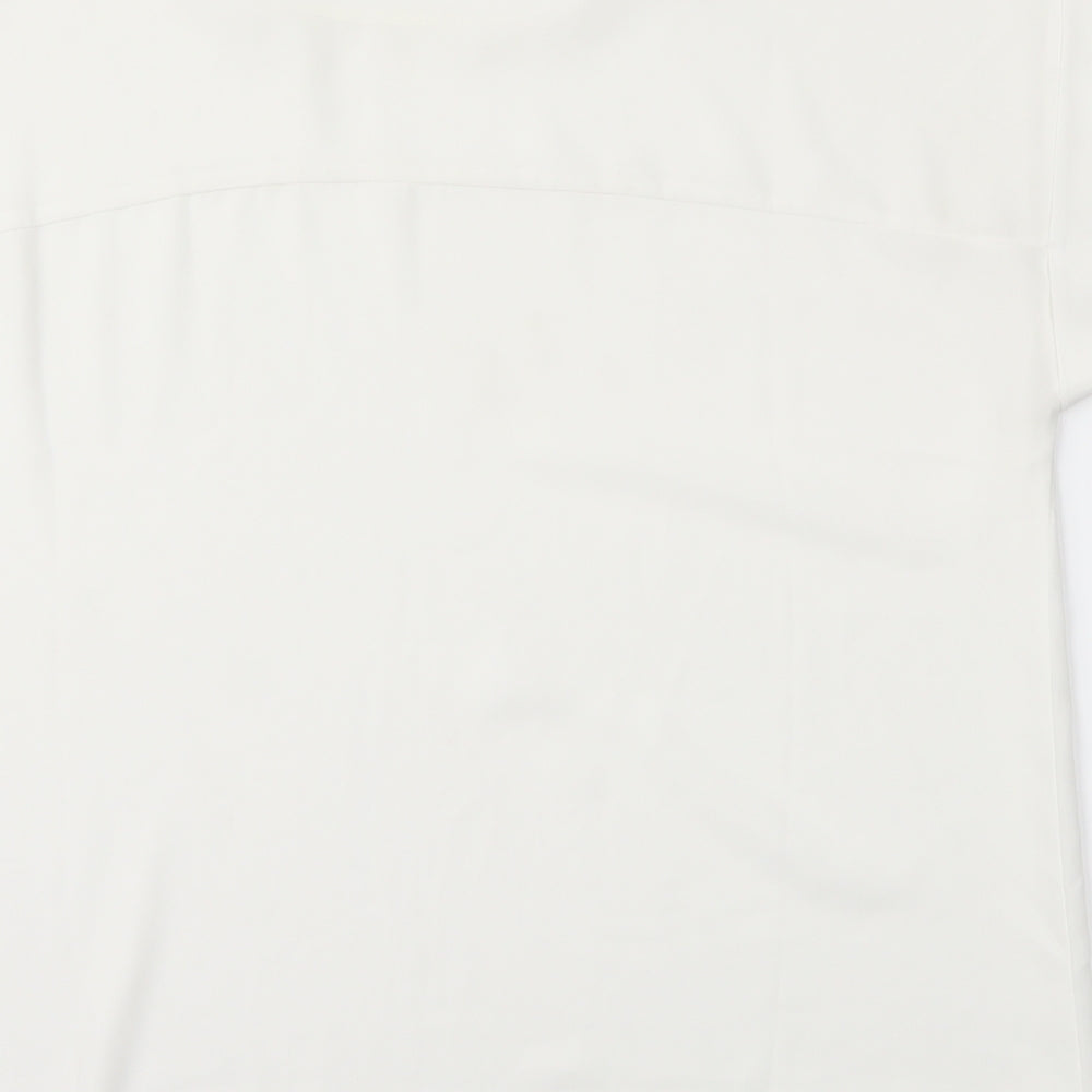 Brand and care label for Forever 21 women’s white basic blouse, size S