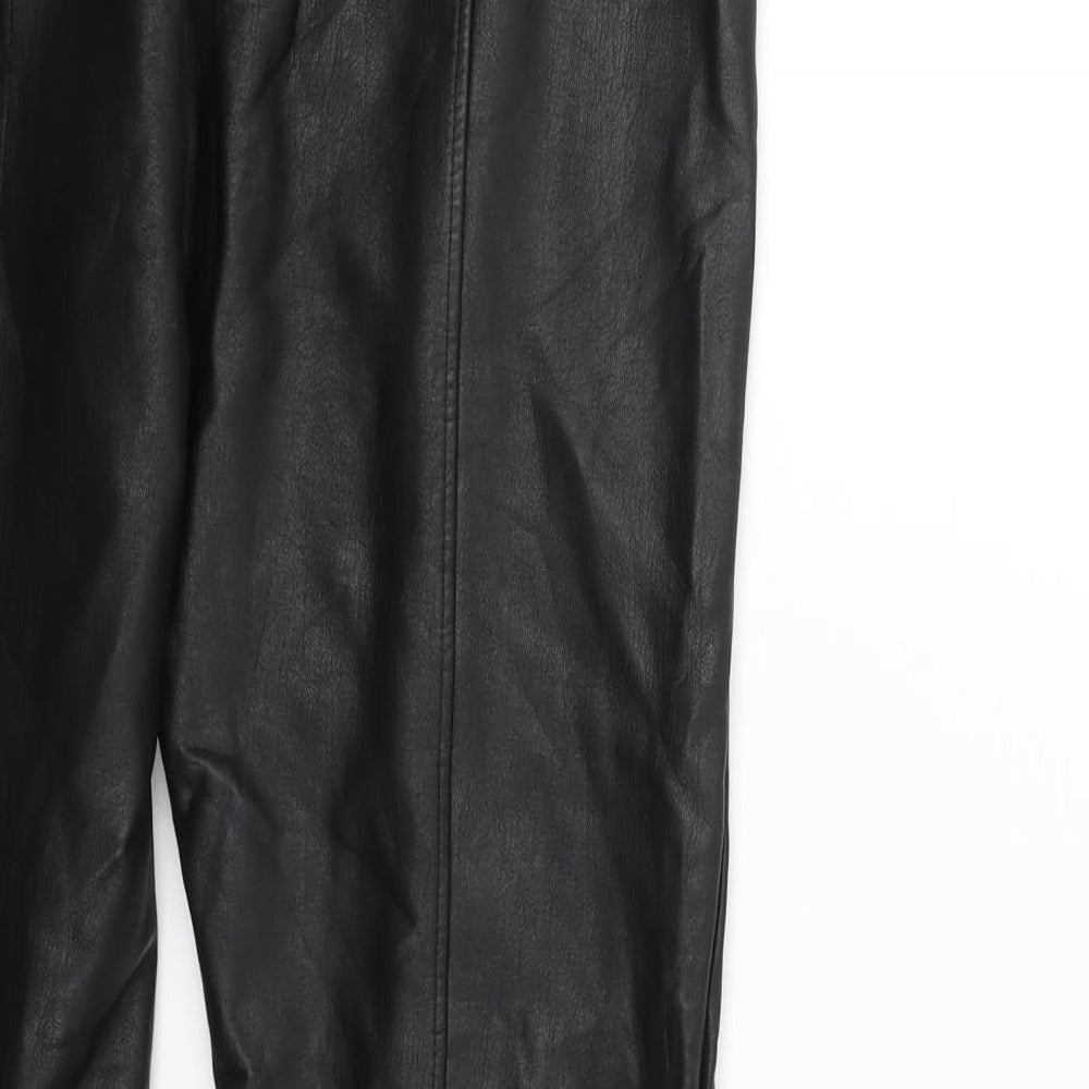 Brand and care label for New Look women’s black trousers, size UK 12, 27-inch leg