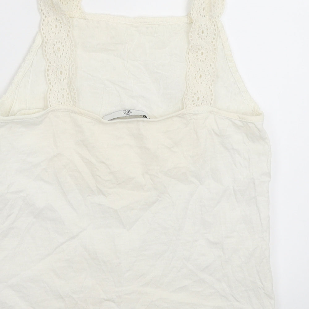 Brand and care label for Marks & Spencer girls’ white basic tank, size 10-11, years