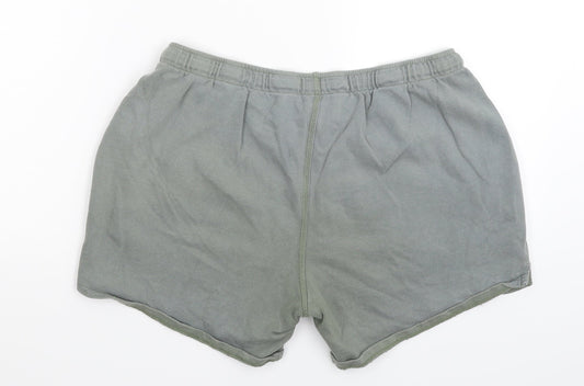 Back view of ASOS women’s green sweat shorts, size UK 32, in