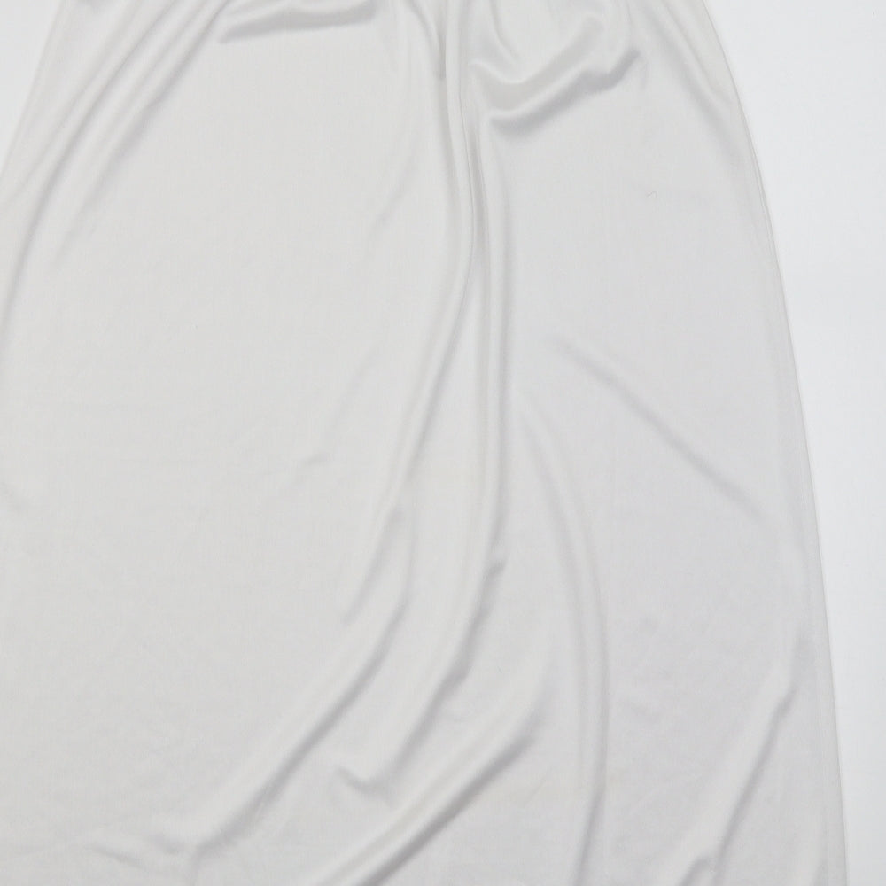 Brand and care label for Marks & Spencer women’s white a-line skirt, size UK 12
