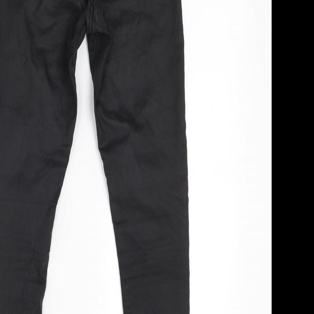 Brand and care label for Topshop women’s black denim skinny jeans, size UK 25, in, 23-inch leg