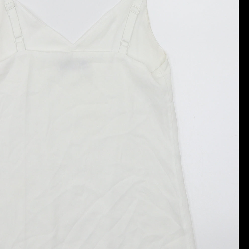 Brand and care label for F&F women’s white basic tank, size UK 10