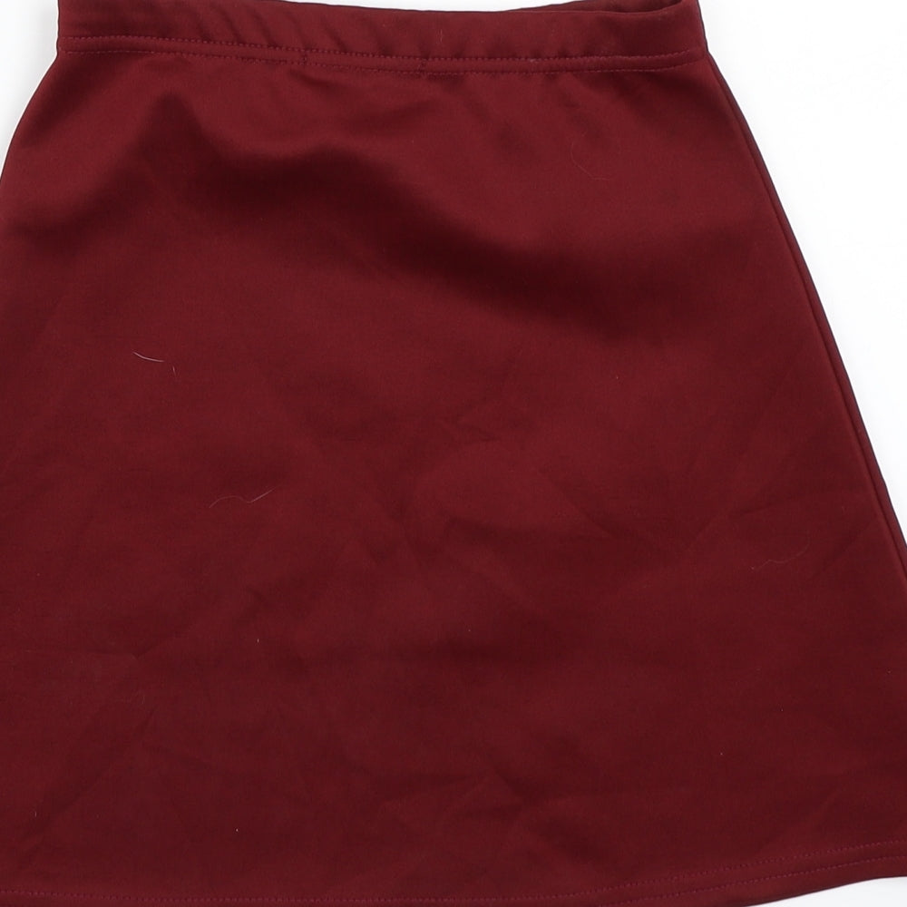 Brand and care label for PRETTYLITTLETHING women’s red a-line skirt, size UK 4