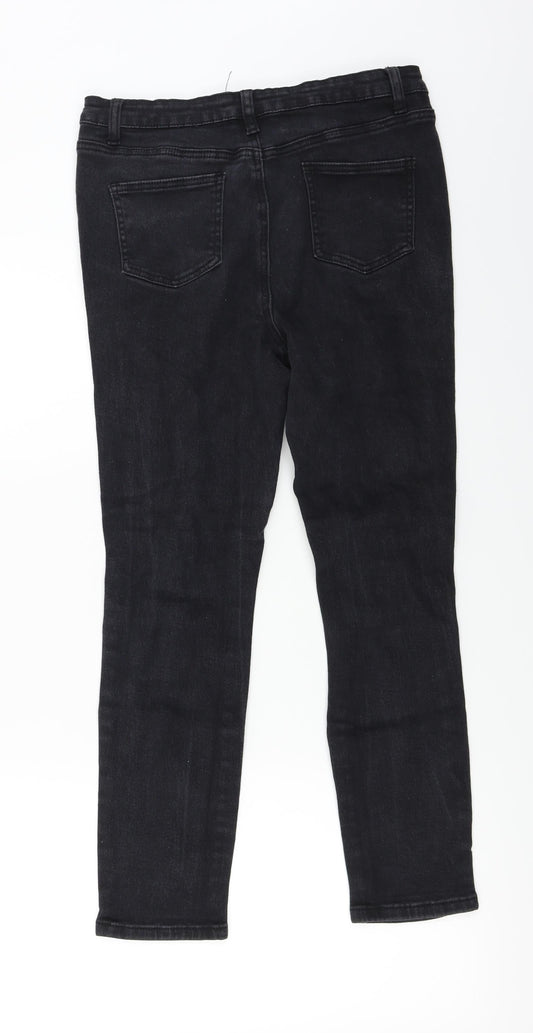 Back view of Boohoo women’s black skinny jeans, size UK 12, 24-inch leg