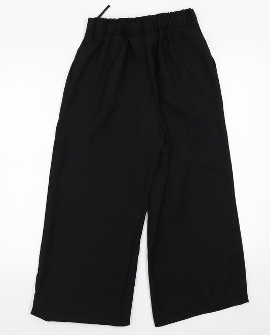Back view of Newlook women’s black trousers, size UK 8, 23-inch leg