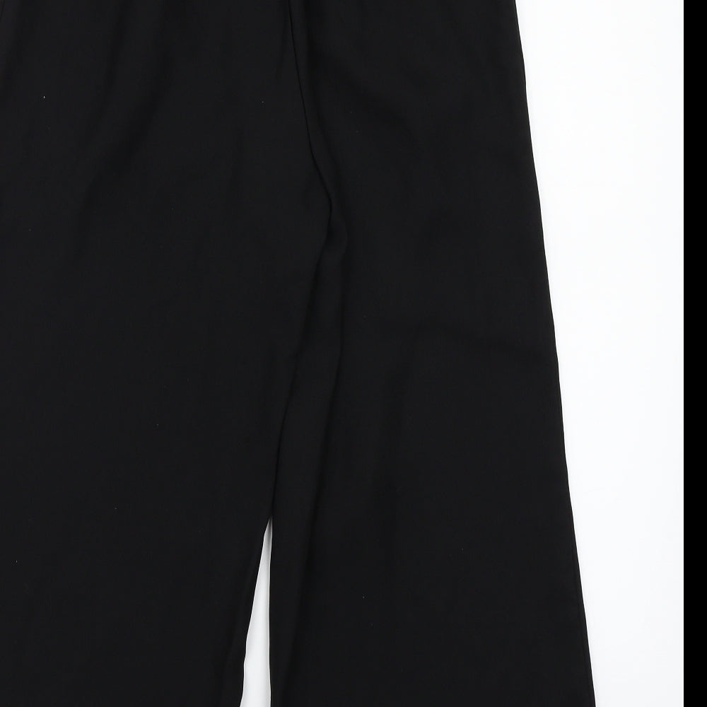 Brand and care label for Newlook women’s black trousers, size UK 8, 23-inch leg