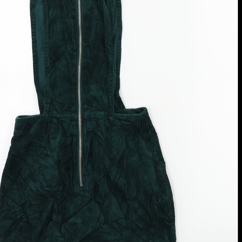 Brand and care label for Miss Selfridge women’s green corduroy pinafore/dungaree dress, size UK 6