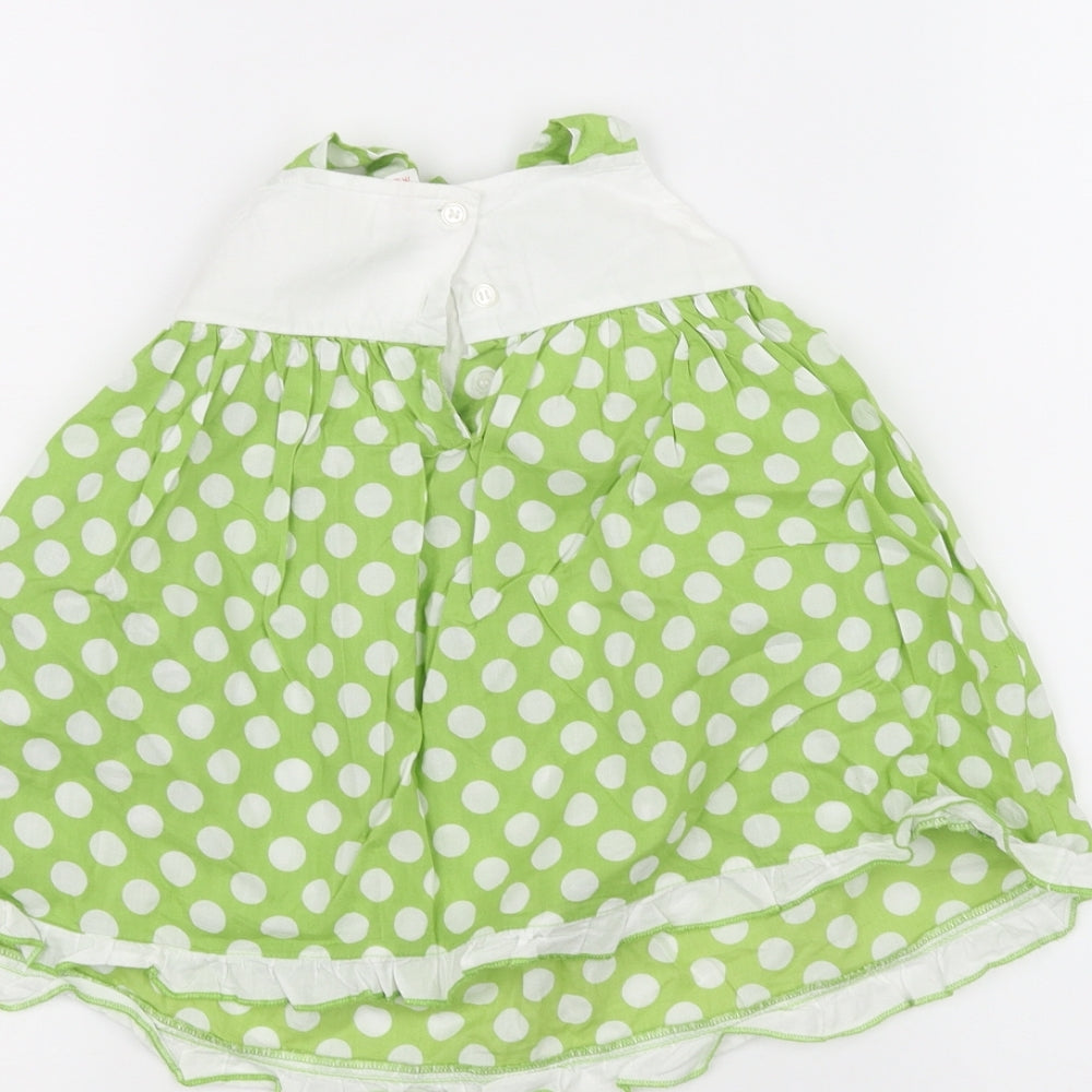 Brand and care label for Next Baby Green Polka Dot A-Line, size 3-6, Months