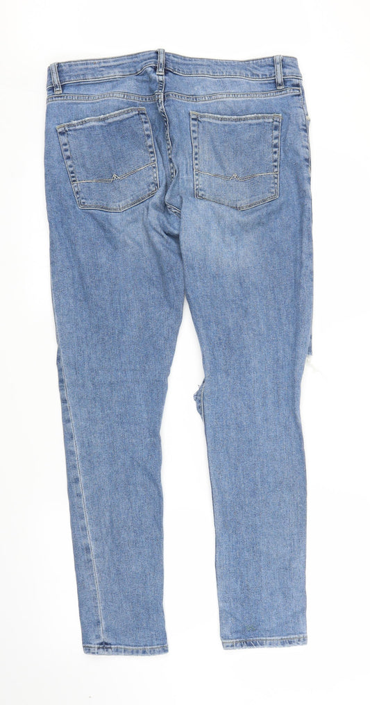 Back view of ASOS women’s blue denim skinny jeans, size UK 33, in, 30-inch leg