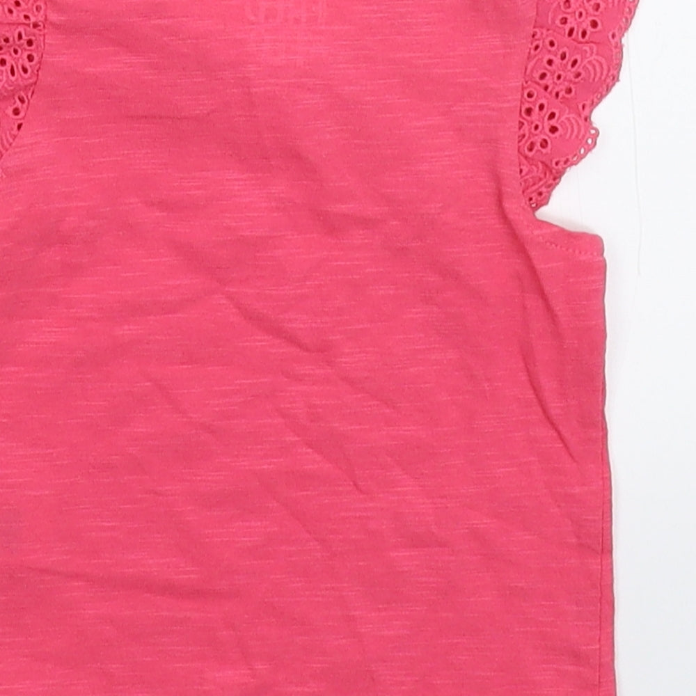 Brand and care label for Fred & Flo girls’ pink basic t-shirt size newborn
