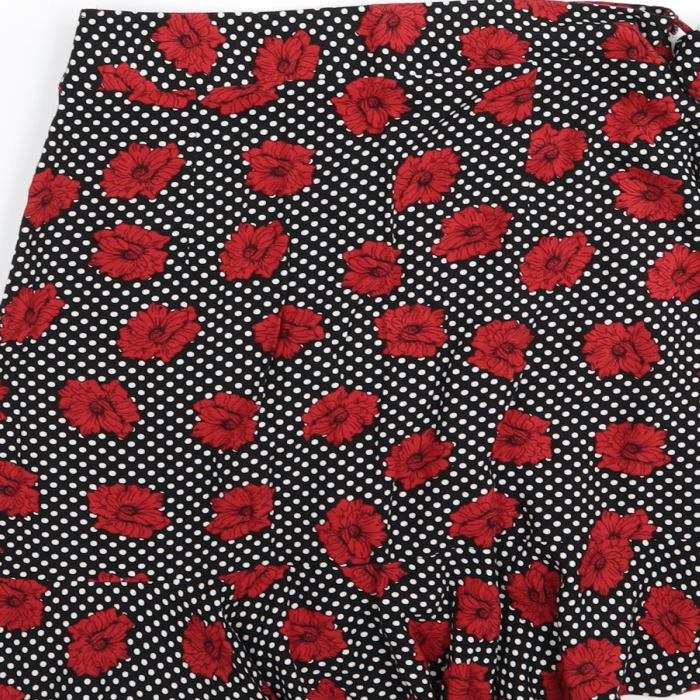 Brand and care label for Papaya women’s black polka dot flare skirt, size UK 8