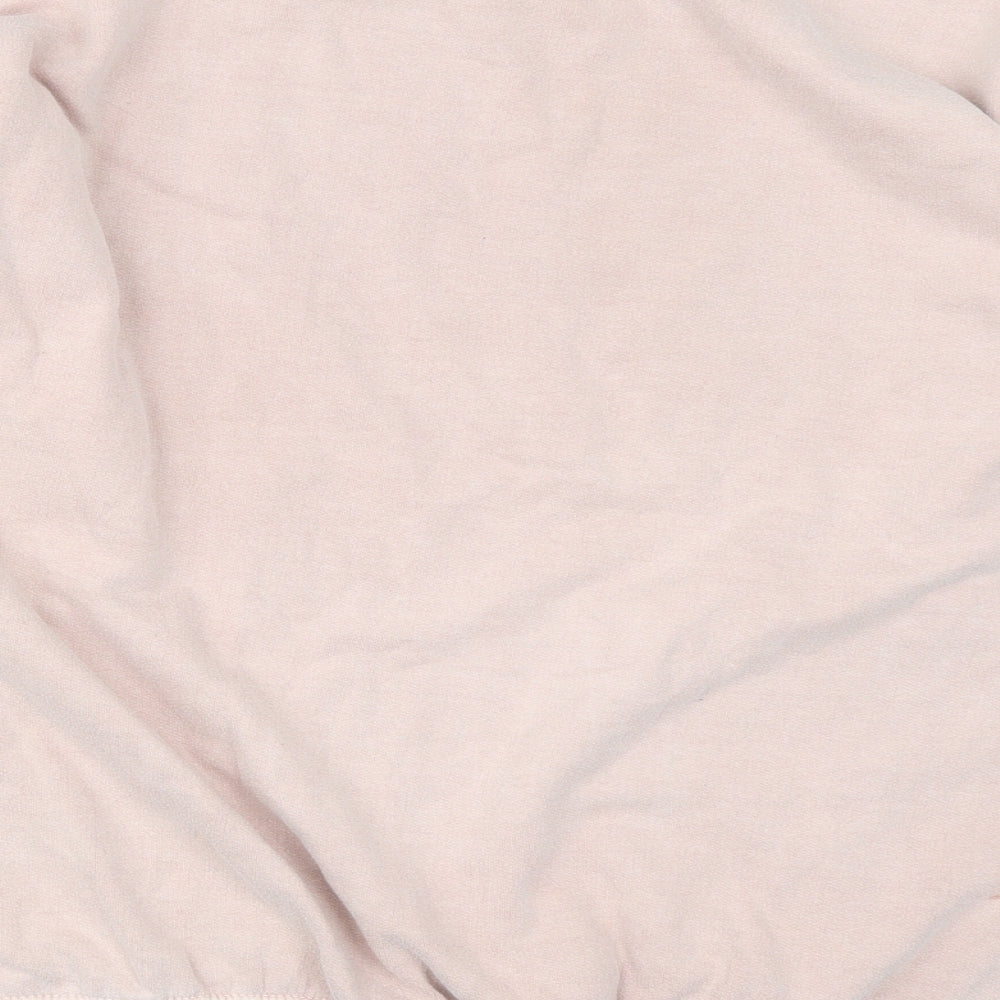 Brand and care label for AsYou women’s pink pullover sweatshirt, size S