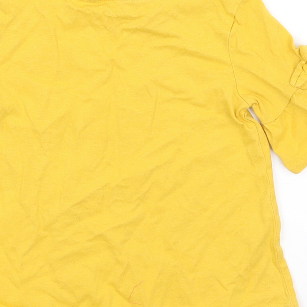 Brand and care label for George girls’ yellow basic t-shirt, size 3-4, years