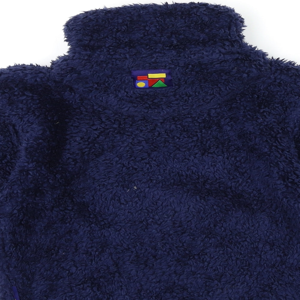 Brand and care label for krazy kidz boys’ blue fleece jacket, size M