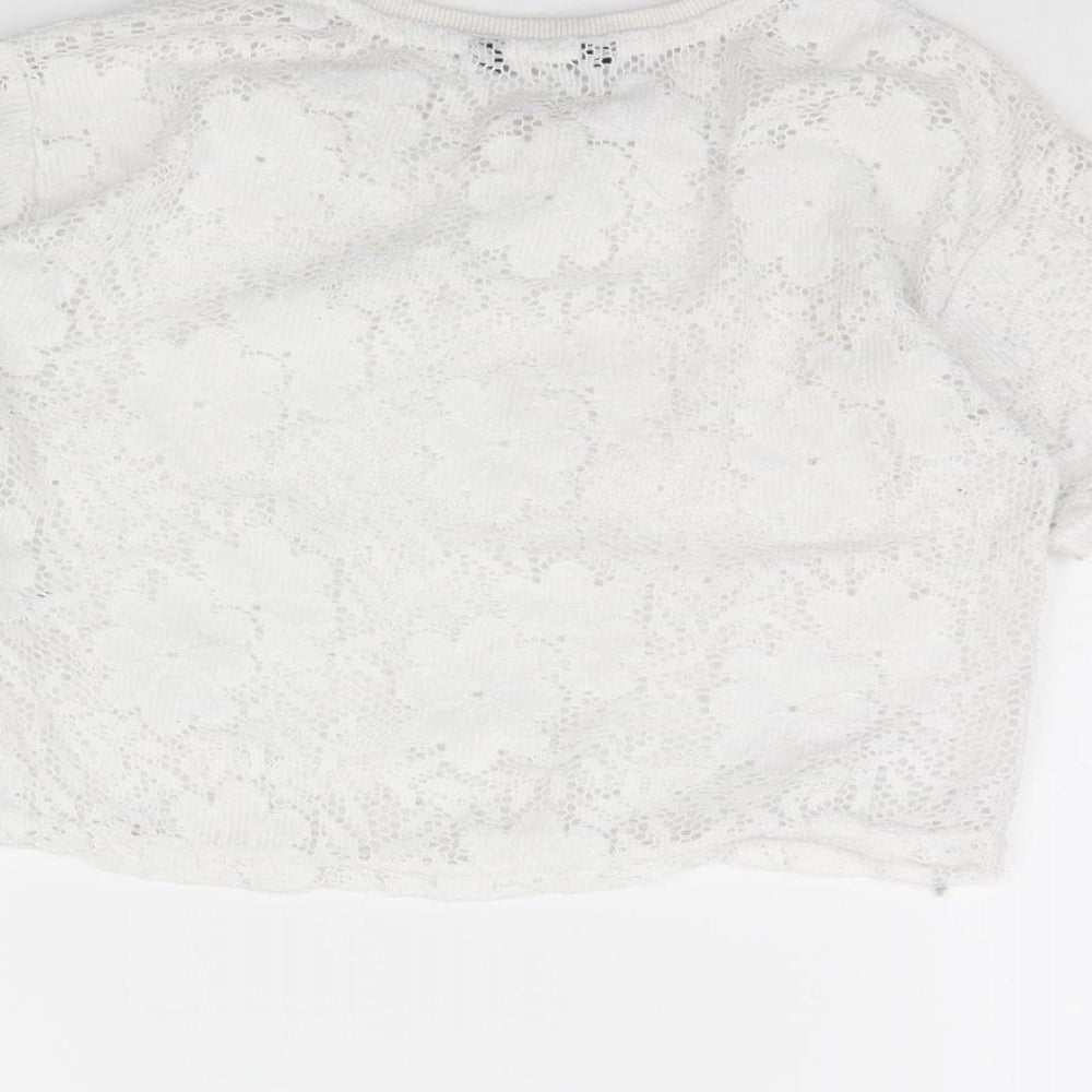 Brand and care label for George girls’ white basic t-shirt, size 6, years