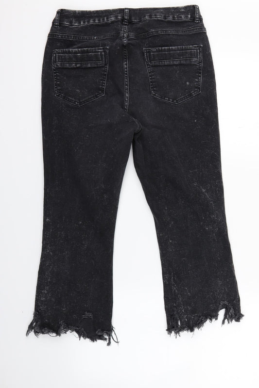 Back view of ASOS women’s black straight jeans, size UK 32, in, 20-inch leg