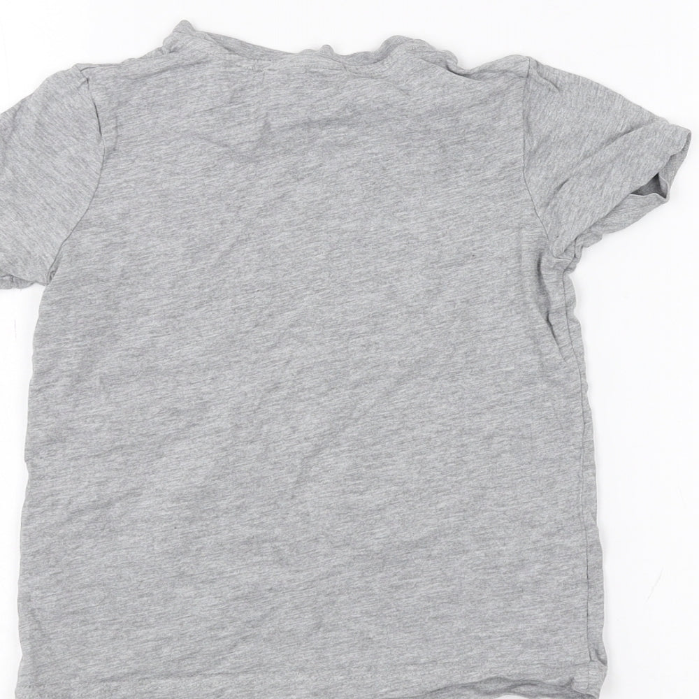 Brand and care label for Tu girls’ grey basic t-shirt, size 3-4, years