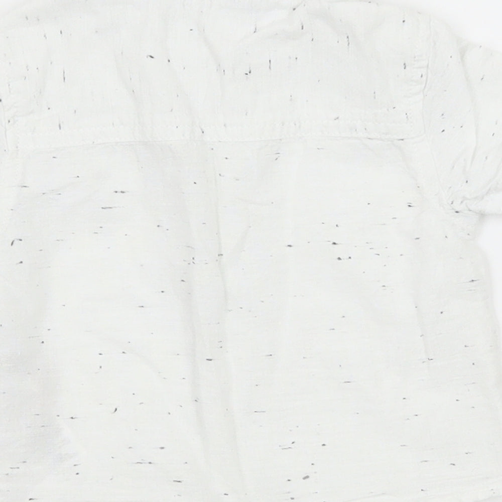 Brand and care label for Primark boys’ white basic button-up, size 3-6, months