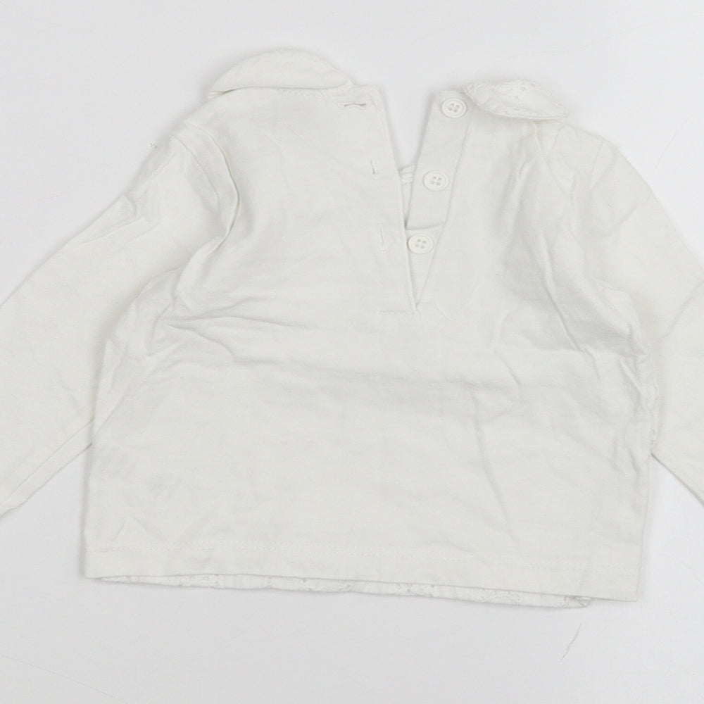 Brand and care label for Tu Baby White Basic T-Shirt, size 6-9, Months