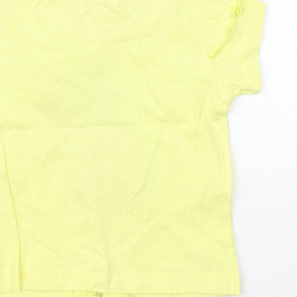 Brand and care label for Primark girls’ yellow basic t-shirt, size 3-6, months