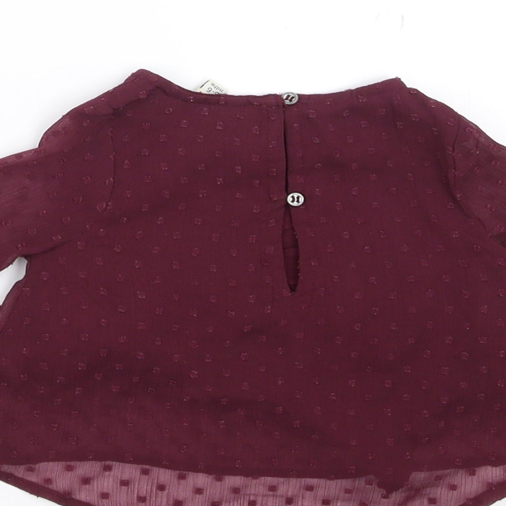 Brand and care label for River Island girls’ purple basic blouse, size 3-6, months