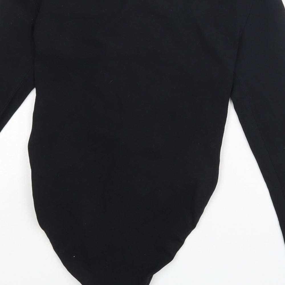 Brand and care label for Topashop women’s black playsuit one-piece, size UK 8