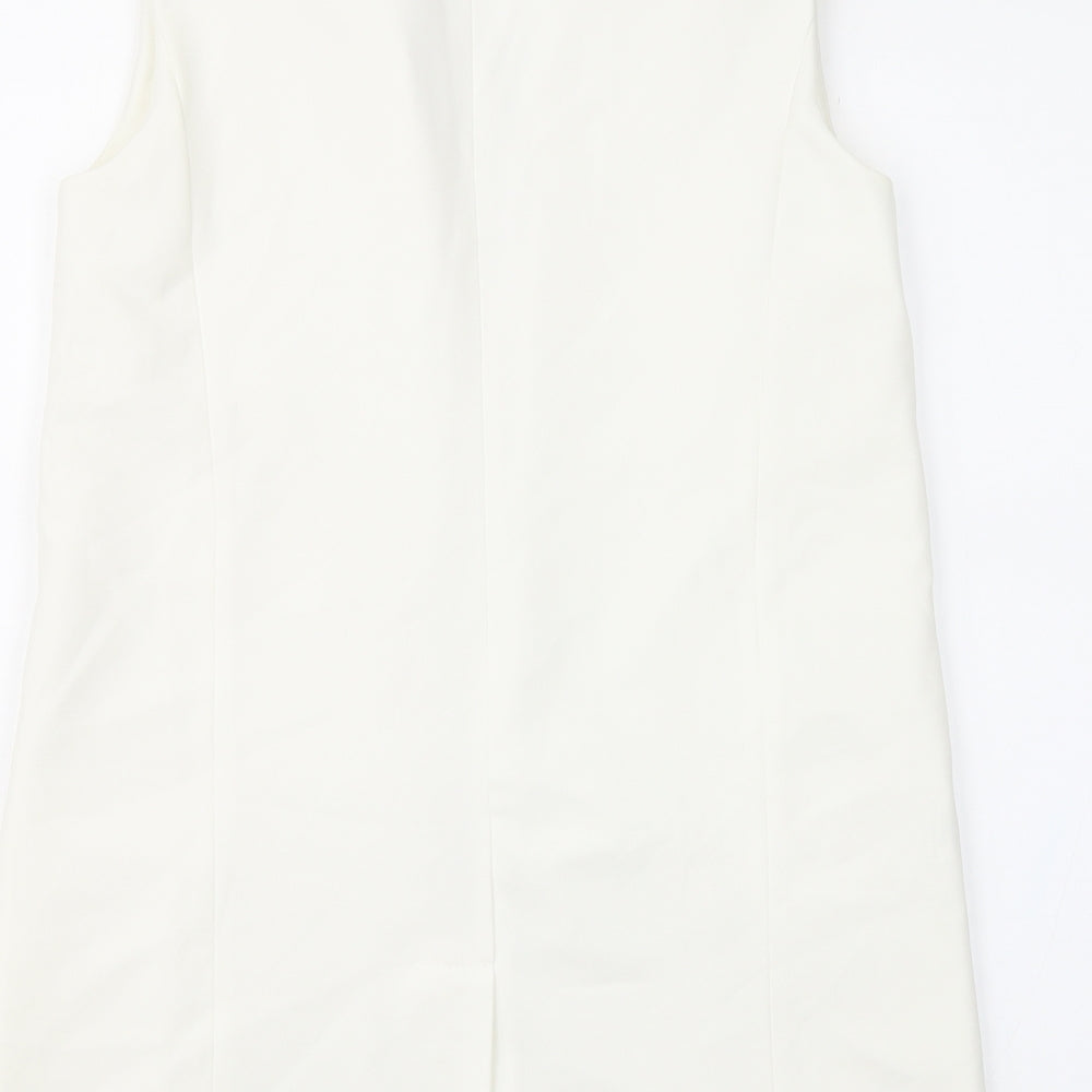 Brand and care label for Missguided women’s white jacket waistcoat, size UK 6