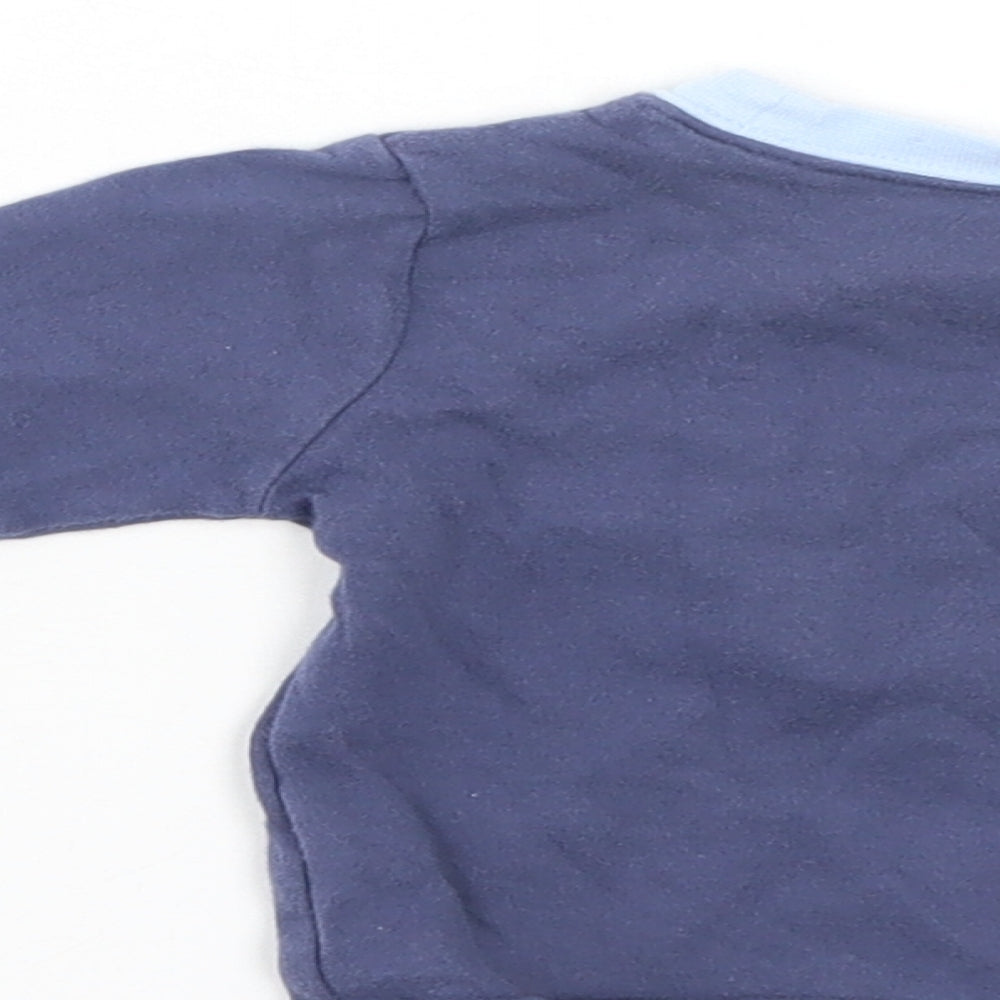 Brand and care label for George boys’ blue jumper, size 3-6, months