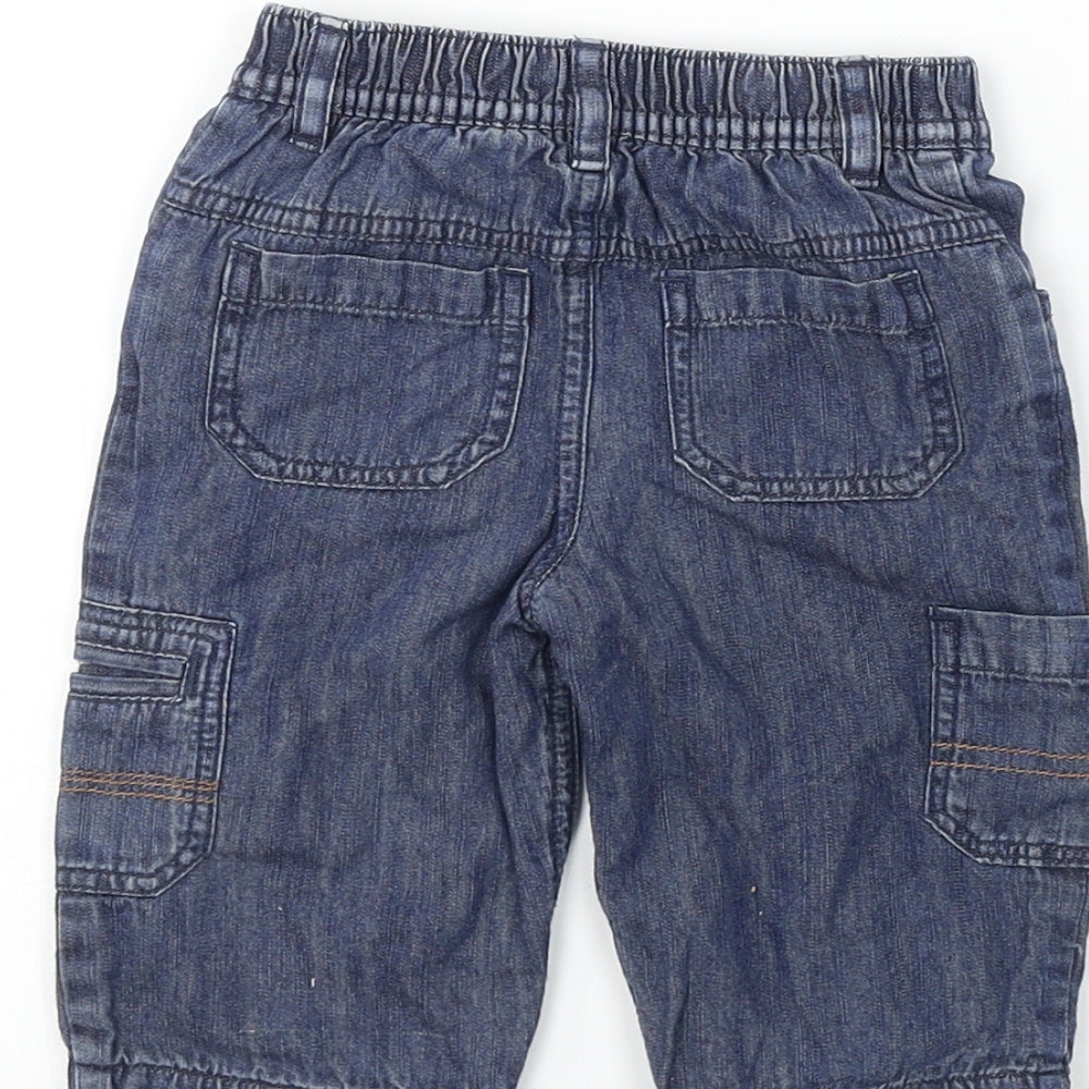 Brand and care label for Cherokee boys’ blue trousers, size 3-6, months