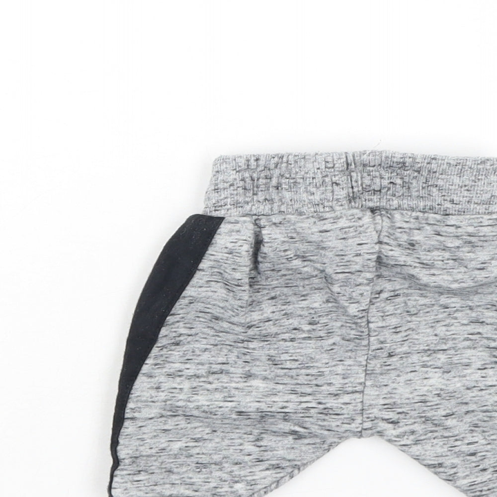 Brand and care label for Primark Baby Grey sweatpants, size 0-3, Months