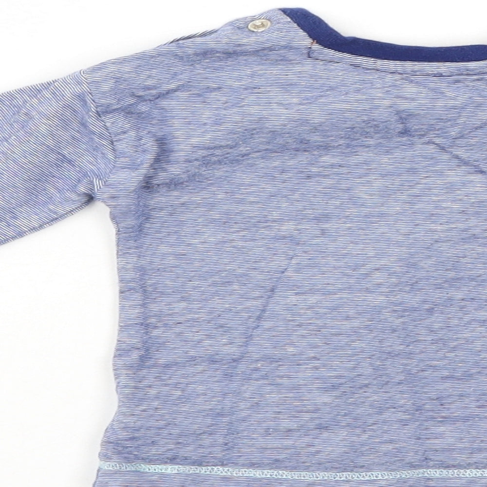 Brand and care label for Mini Club boys’ blue jumper, size 6-9, months