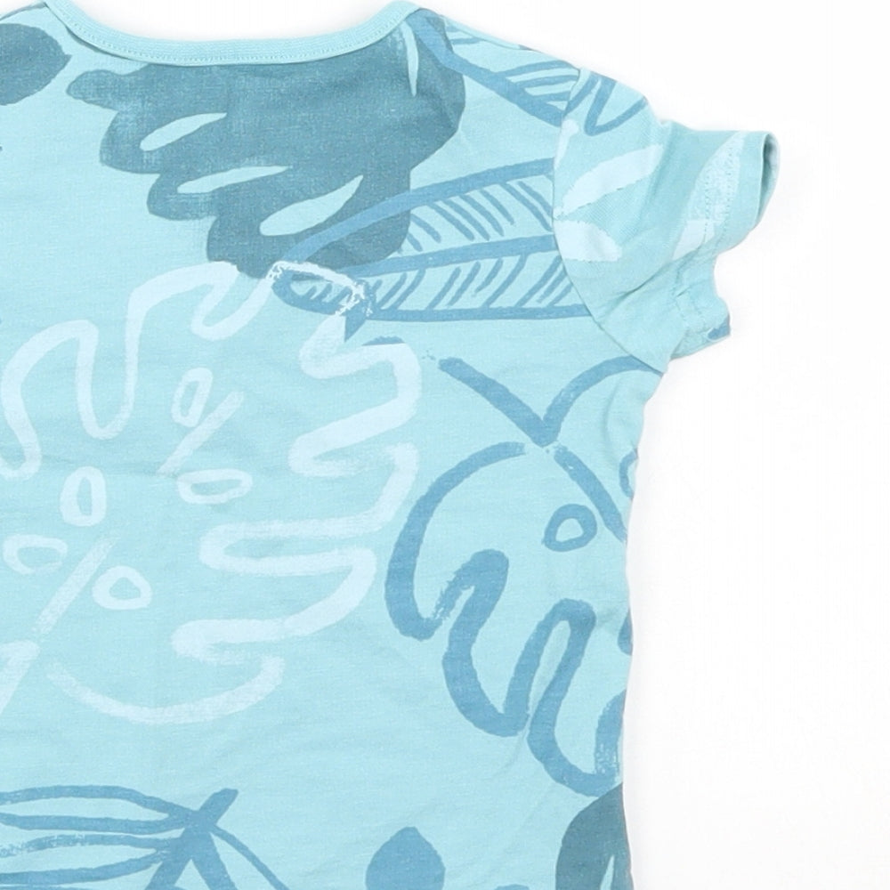 Brand and care label for Tu Baby Blue Basic T-Shirt, size 6-9, Months